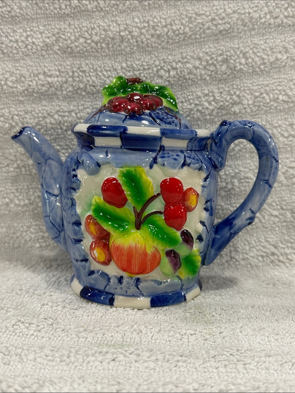 Hand-Painted Blue Ceramic Teapot with Fruit Motif